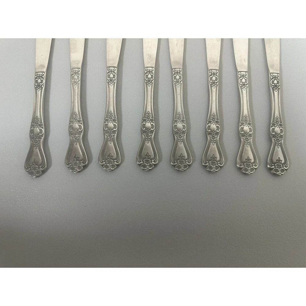 Rogers Co. stainless flatware Rose Set Of 8 dinner knives 8 1/2